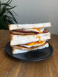 Bacon, Sausage + Egg  Sandwich